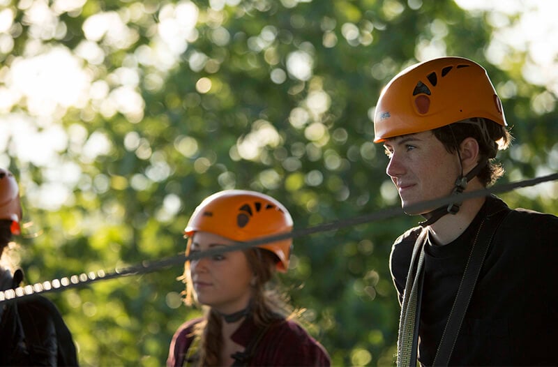 zipliners prepare to go on their zipline adventure